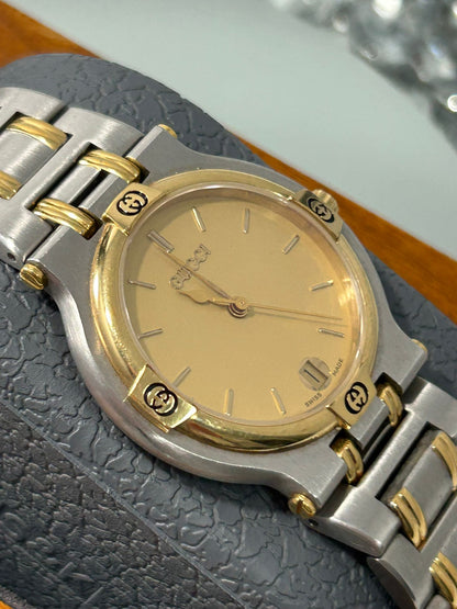 Gucci Vintage 9000M Stainless Steel Gold Bezel Unisex Swiss Quartz Watch