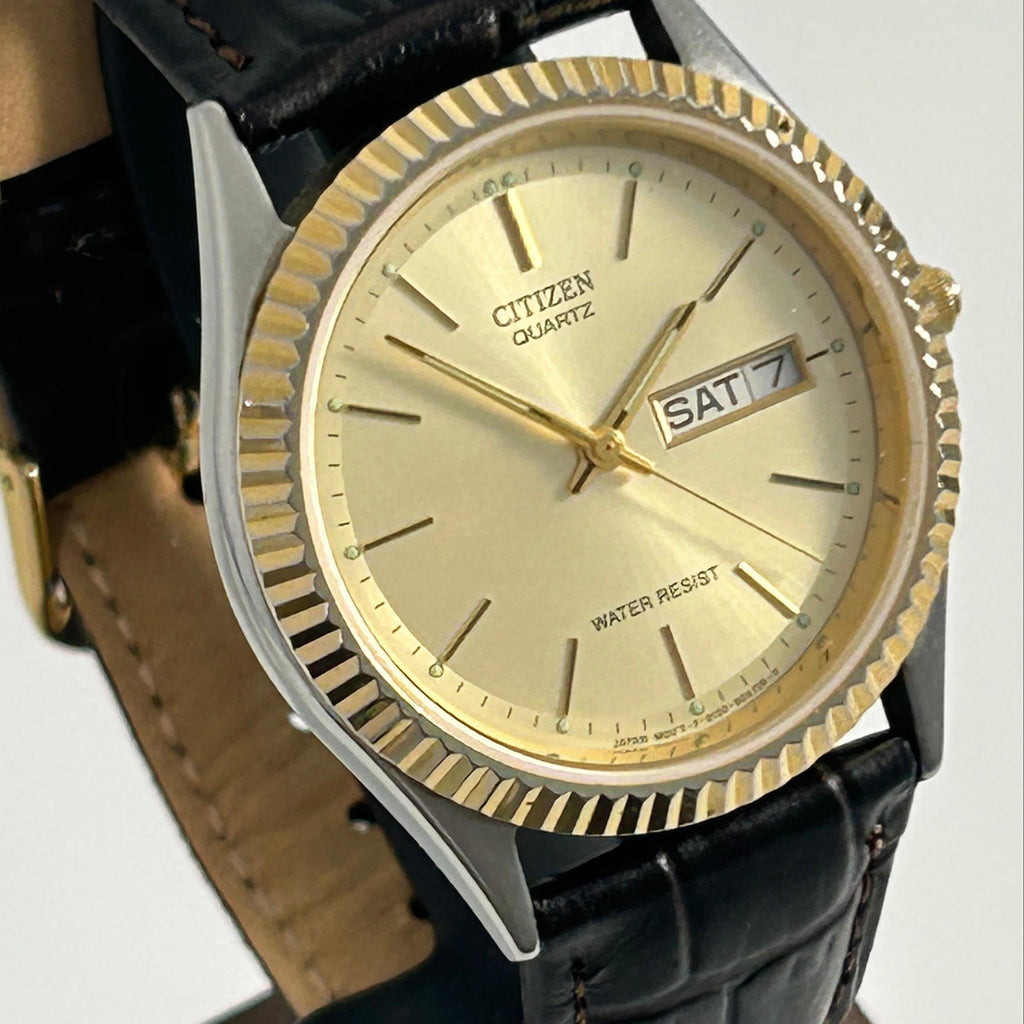 Citizen Quartz Presidential Fluted Bezel Men's Dress Watch — Two-Tone, Champagne Dial, Day-Date, Black Leather Strap