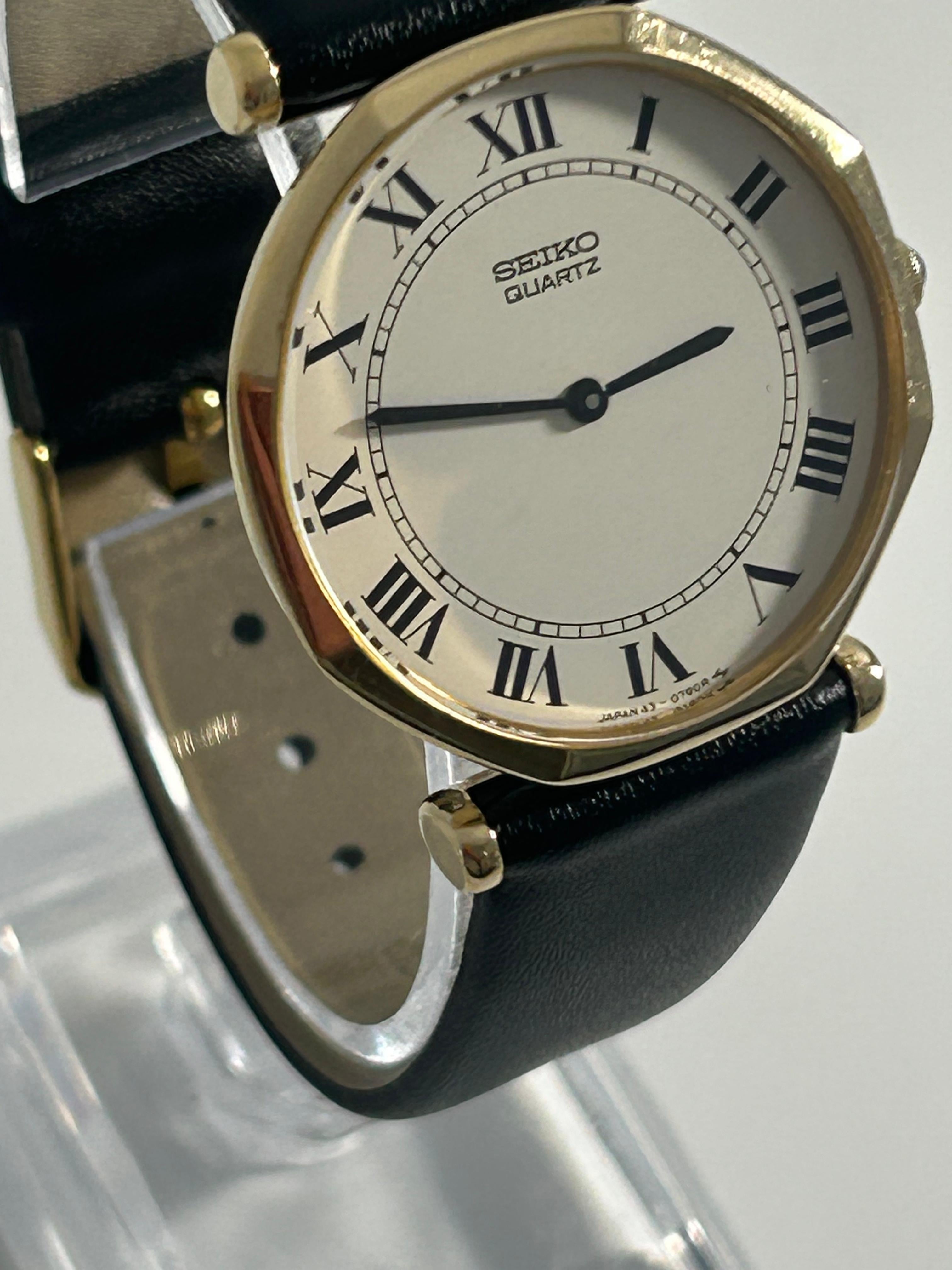 1987 Seiko Vintage Quartz Octagonal Dress Watch — Gold-Tone, White Roman Numeral Dial, Black Leather Strap