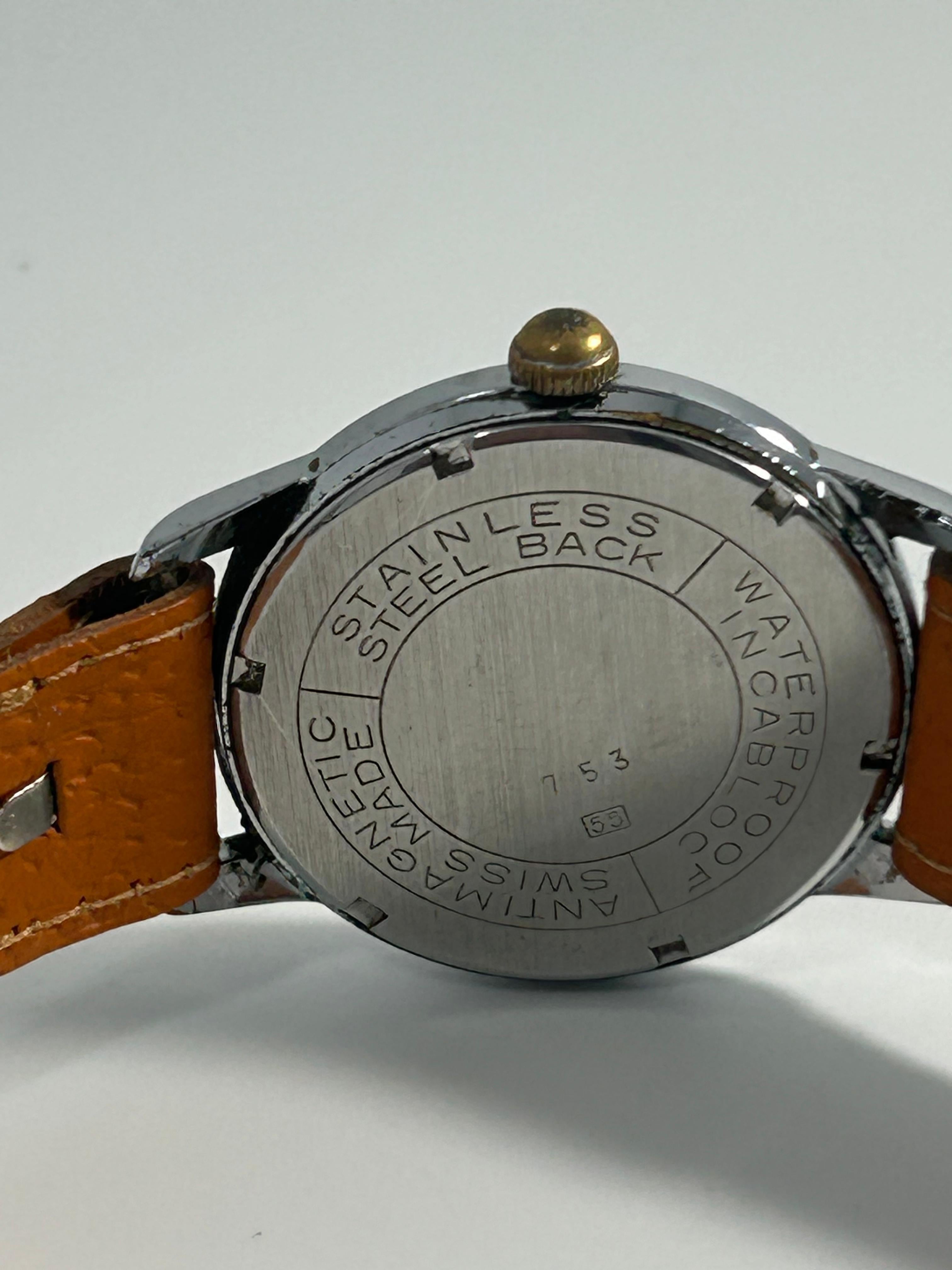 Relino 21 Jewels Incabloc Antimagnetic Vintage Swiss Dress Watch — Stainless Steel, Cream Dial, Tan Leather Strap, 1960s