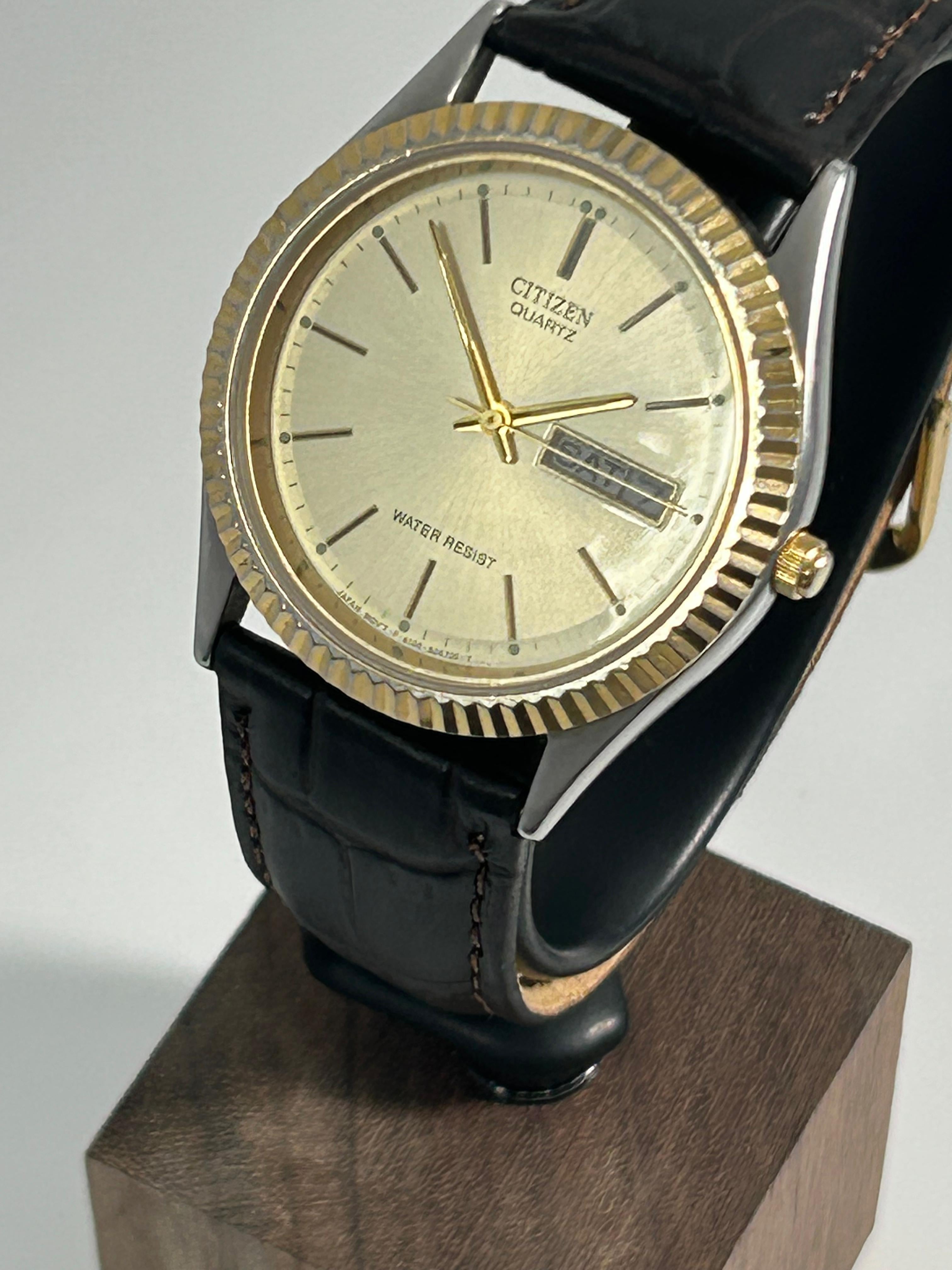 Citizen Quartz Presidential Fluted Bezel Men's Dress Watch — Two-Tone, Champagne Dial, Day-Date, Black Leather Strap